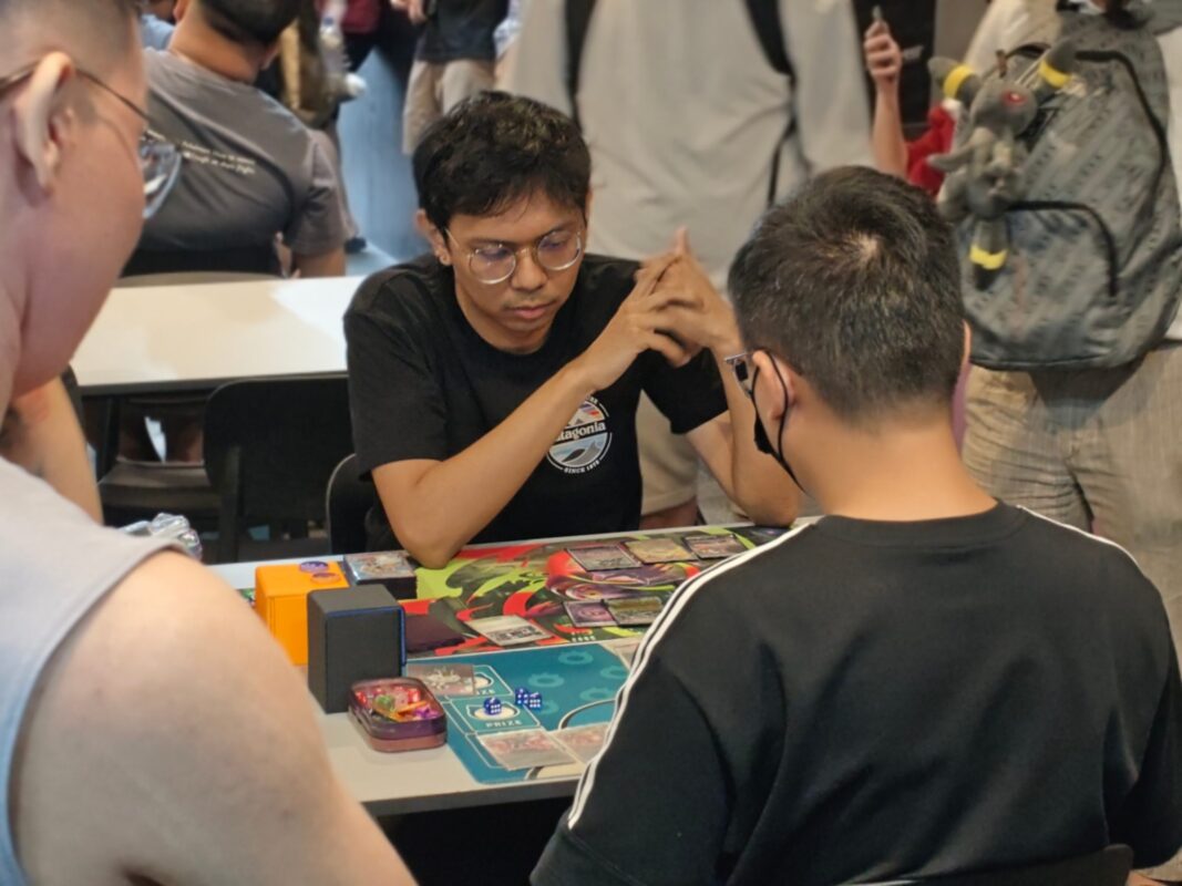 Two players facing off at Atlas Gamers